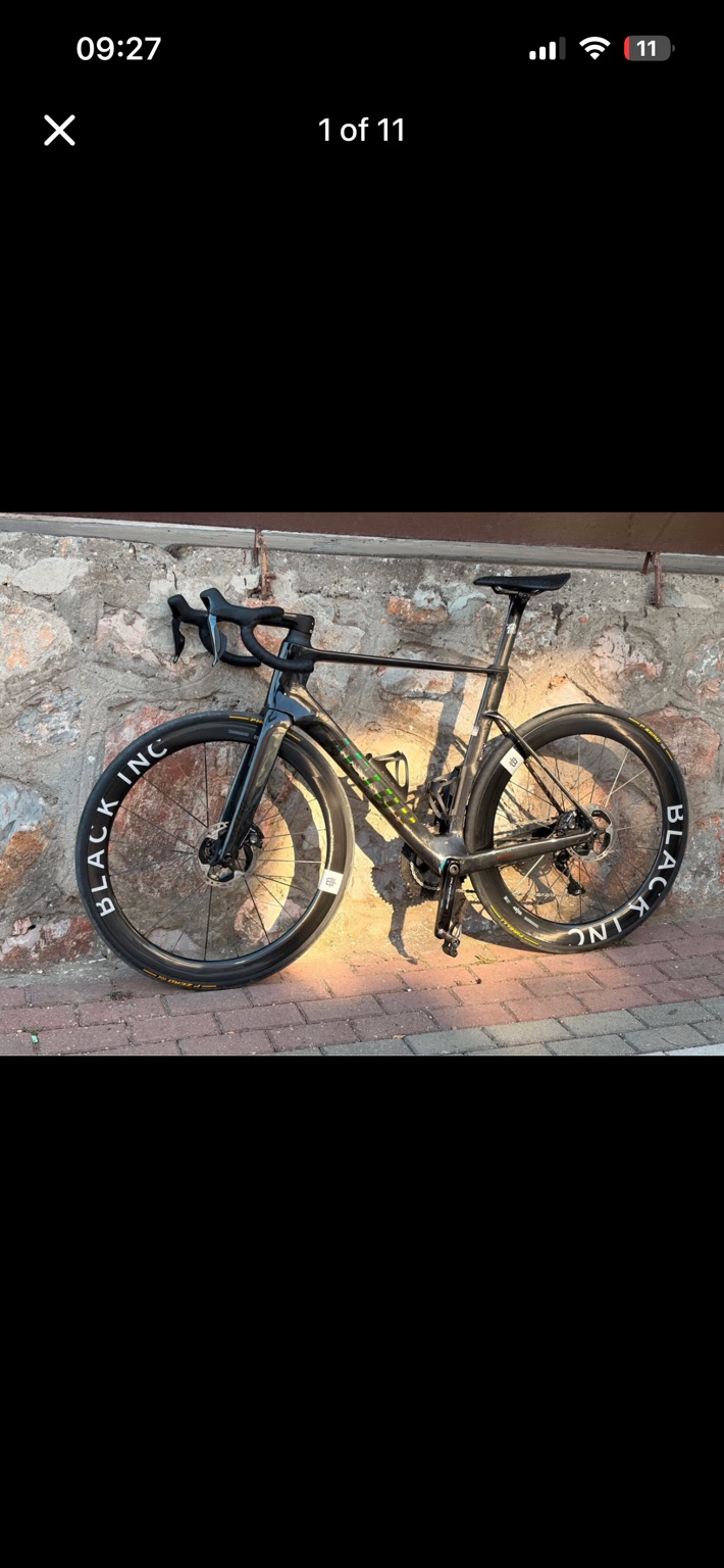 Factor Ostro VAM V2 road bike with Black Inc wheels, drive-side view