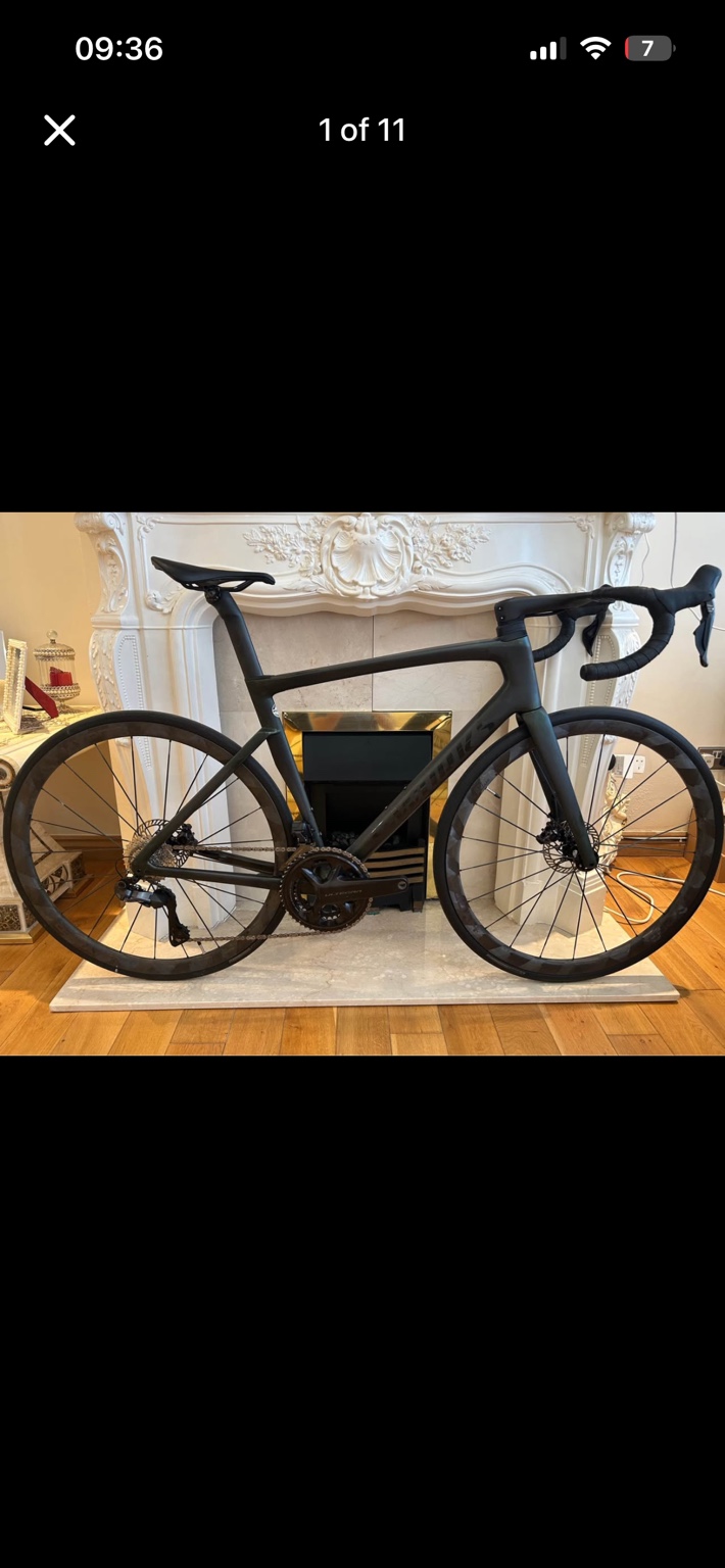 Dark green Specialized S-Works SL7 road bike, drive-side view